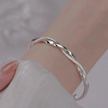 Bracelet torsadé argenté ajustable