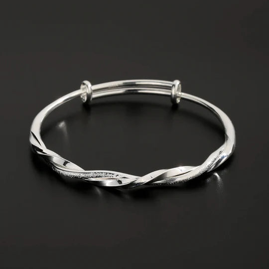 Bracelet torsadé argenté ajustable