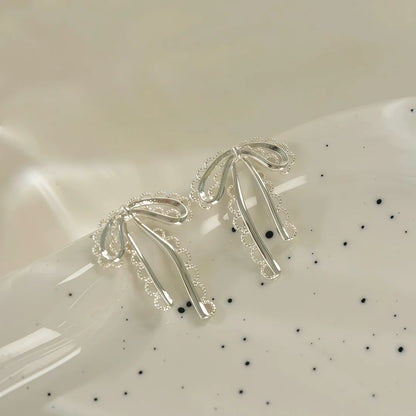 Boucles d'Oreilles Ruban Sculptural