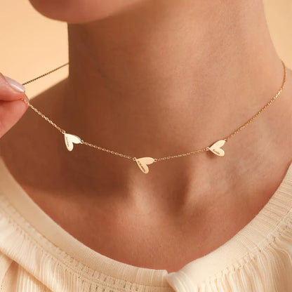 Collier personnalisé aux cœurs gravés