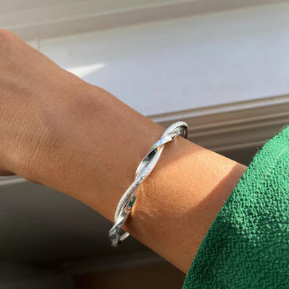 Bracelet torsadé argenté ajustable