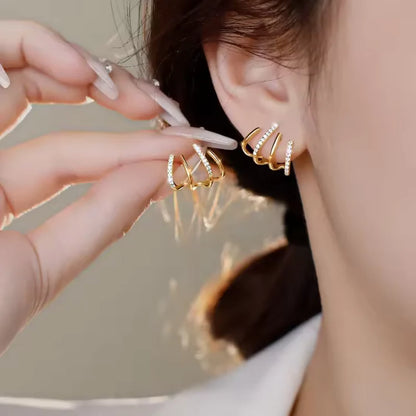 Boucles d'oreilles créoles à triple arc