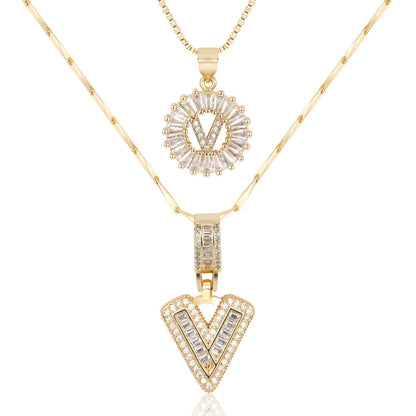 Colliers avec initiale en diamant