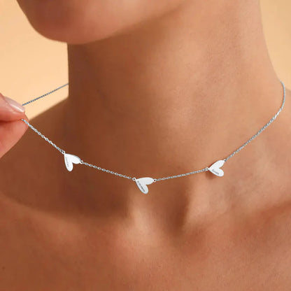 Collier personnalisé aux cœurs gravés