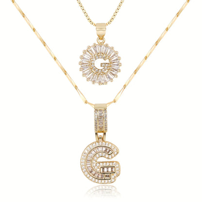 Colliers avec initiale en diamant