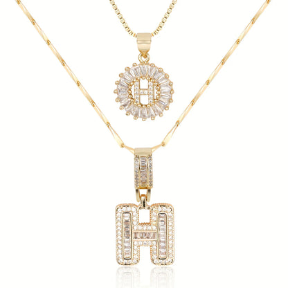 Colliers avec initiale en diamant