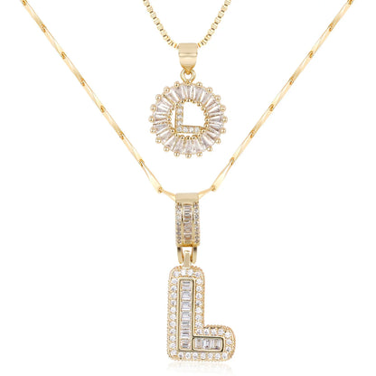 Colliers avec initiale en diamant