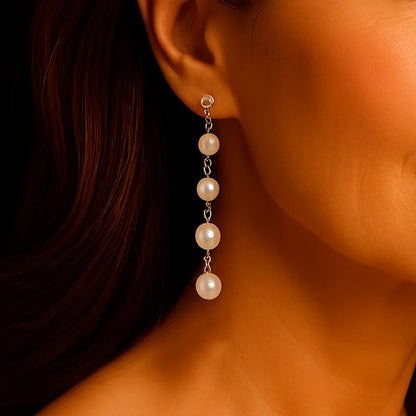 Boucles Pendantes à Perles Blanches