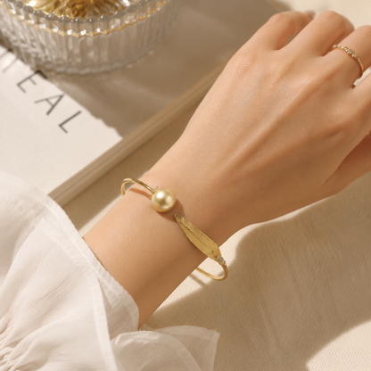 Bracelet précieux en perle dorée