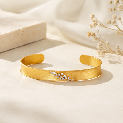 Bracelet manchette ouverte en or