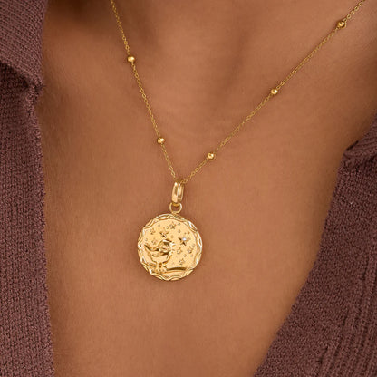 Collier médaille oiseau étoilé