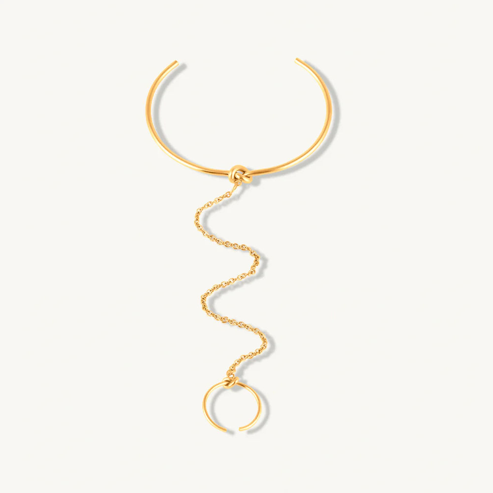 Bracelet manchette avec bague liée