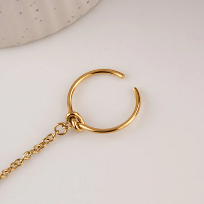 Bracelet manchette avec bague liée