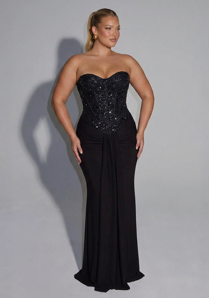 Robe de soirée longue sans bretelles ornée de corset drapé