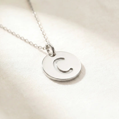 Collier médaille initiale