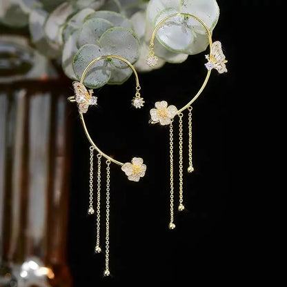 Boucles d’oreilles papillon à franges