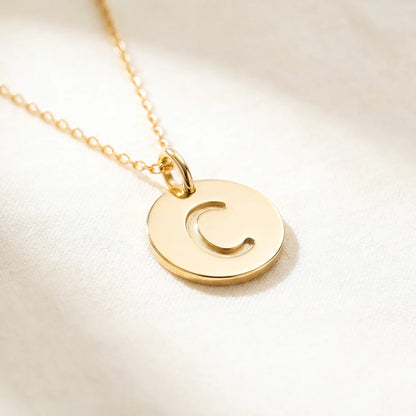 Collier médaille initiale